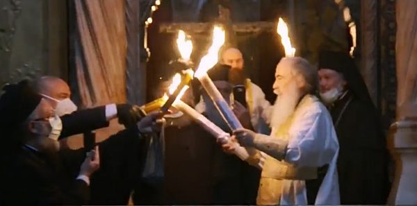 Pace în lume! Sfânta lumină a fost primită la Ierusalim (VIDEO)