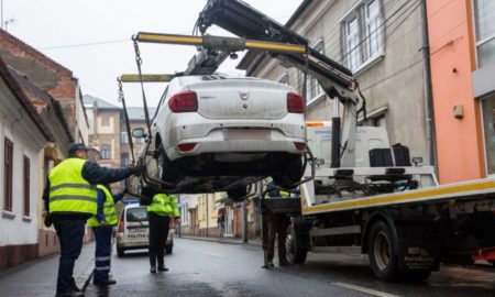 Războiul mașinilor ridicate din București. Cât costă să-ți recuperezi vehiculul